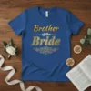 Brother of the Bride text design with gold glitter font and floral accents on a blue t-shirt