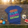 Bruh It's My Daughter's Birthday text in bold, distressed neon colors on a royal blue t-shirt