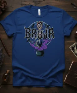 Bruja t-shirt with gothic text, sugar skulls, black cat, cauldron, and crows graphic design