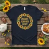 Bubbe Knows Best t-shirt with a yellow sunflower wreath design and classic typography