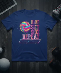 Bump Set Spike Repeat text design with a colorful volleyball graphic and net illustration on a navy blue t-shirt