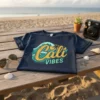 Cali VIBES t-shirt with a retro wave and palm tree design, featuring text in yellow and teal
