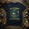 Call Me Magic Cuz I Be Gathering t-shirt with a wizard frog holding money, text in gold, magical theme