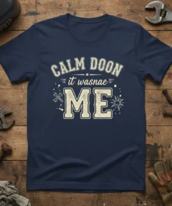 Navy t-shirt with "Calm Doon it Wasnae Me" in distressed cream lettering, featuring wrench and spark graphics