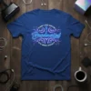Can I Go Back I Graduated To Bed Now? quote on a blue t-shirt with neon-like lettering and ornate design