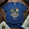 Can We Go Hunting Now? text with a black labrador retriever wearing a hunting vest, set against a mountain and