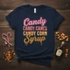 Navy t-shirt with the text "Candy Candy Canes Candy Corn Syrup" in colorful, festive fonts