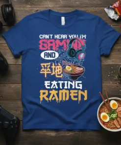 Can't Hear You I'm Gaming And Eating Ramen text with headphones and ramen bowl graphic on a blue t-shirt