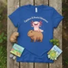 Capybara and axolotl friends on a blue t-shirt with "Capybara & Axuatol Adventures" text