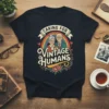 Caring for Vintage Humans t-shirt with retro illustration of elderly couple under rainbow