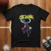 Black t-shirt with "CAT DUNK" text above a neon-outlined basketball hoop, featuring a cat in basketball attire mid-dunk holding a