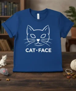 White line art of a cat's face with "CAT • FACE" text below, printed on a royal blue t-shirt