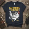 Cat riding a chicken with the text "Cat Riding Chicken" above, graphic t-shirt design