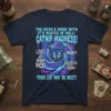 Catnip Madness T-Shirt with "The Devil's Weed with It's Roots in Hell" quote and a fierce blue and purple cat