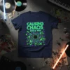 Navy t-shirt with "CAUSING CHAOS SINCE 1960" in neon green and purple graphic design
