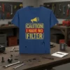 Blue t-shirt with yellow and red text that reads "CAUTION I HAVE NO FILTER" and a megaphone graphic