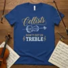 Cellists DON'T GET IN TREBLE quote with a cello graphic on a blue t-shirt, surrounded by music sheets