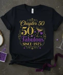 Black t-shirt with "Chapter 50 50 Fabulous SINCE 1975" in gold and purple glitter text, featuring a martini glass graphic