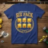 Blue t-shirt design with "CHECK OUT MY SIX PACK" text above six ravioli squares arranged in a 3x2 grid, surrounded