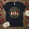 Black t-shirt with "Choose Love Gnome matter what" text and four cute gnomes holding hearts, framed by a golden wreath