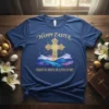 Happy Easter t-shirt with "Christ Is Risen! He Lives In Me!" quote, golden cross, and watercolor landscape