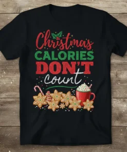 Christmas Calories Don't Count text with gingerbread cookies, candy canes, and hot cocoa graphic on a black t-shirt
