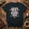 I Hate Being Sexy But I'm A Chubby Bearded Man So I Can't Help It quote on a black t-shirt