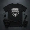 Black t-shirt with white "CHURCH SECURITY" text and emblem of a dove with crossed rifles