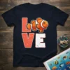 Clownfish Love t-shirt design featuring a cute clownfish and textured "LOVE" text