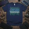 Computer Whisperer T-Shirt featuring blue and white text on a navy shirt, surrounded by a green circuit board design