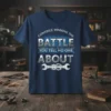Navy t-shirt with the quote "CONTINUE WINNING THE BATTLE YOU TELL NO ONE ABOUT" in distressed white and silver typography