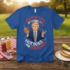Trump holding a hot dog with text "Convicted of Loving Hot Dogs and Freedom" on a blue t-shirt