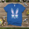 Cool Bunny Sunglasses graphic t-shirt featuring a cartoon bunny face with pastel gradient sunglasses and pink inner ears