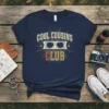 Navy t-shirt with "COOL COUSINS CLUB" text and retro sunglasses graphic
