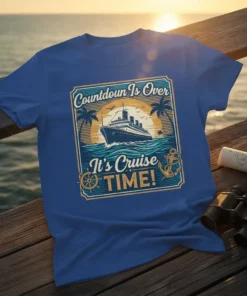 Blue t-shirt featuring "Countdown Is Over It's Cruise TIME!" text with a cruise ship, ocean, palm trees, and anchor graphic
