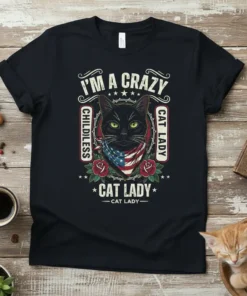 Black t-shirt featuring "I'm a Crazy Childless Cat Lady" text with a black cat wearing an American flag bandana and