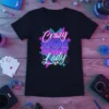 Crazy GAME NIGHT Lady text design with neon accents and palm trees on a black t-shirt, featuring dice graphics
