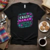 I'm That Crazy Mamaw Everyone Told You About text design with floral accents on a black t-shirt