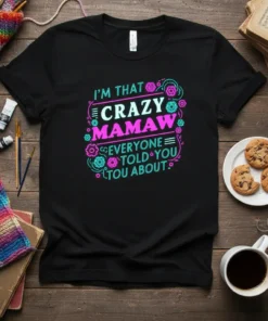 I'm That Crazy Mamaw Everyone Told You About text design with floral accents on a black t-shirt
