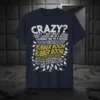Navy t-shirt with "CRAZY? I WAS CRAZY ONCE. THEY LOCKED ME IN A ROOM, A RUBBED ME IN A ROOM."