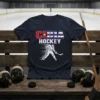 CUBA HOCKEY text with Cuban flag elements above a hockey player illustration, on a navy t-shirt