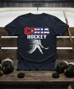 CUBA HOCKEY text with Cuban flag elements above a hockey player illustration, on a navy t-shirt