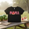 Black t-shirt with the word "MAMA" in pink bubble letters and a cute smiling watermelon slice graphic