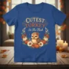 Cutest Turkey In The Flock t-shirt design featuring a baby turkey, pumpkins, and fall flowers in a wreath