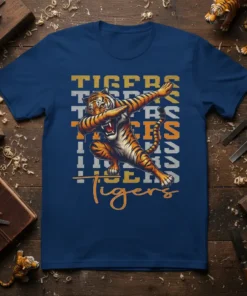 TIGERS TIGERS TIGERS TIGERS TIGERS TIGERS Tigers t-shirt design with a dabbing tiger graphic and orange script text