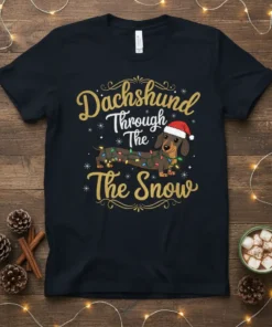 Dachshund Through The Snow Christmas T-Shirt featuring a dachshund wearing a Santa hat and wrapped in colorful lights