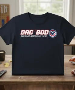 Dad Bod Average American Hero text with shield graphic on a navy blue t-shirt