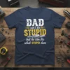 Dad can't fix STUPID but he can fix what STUPID does quote on a navy blue t-shirt, featuring distressed text