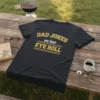 Dad Jokes are how Eye Roll text design on a black t-shirt, with yellow distressed font and stripes