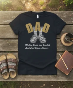 Black t-shirt with "DAD Making Socks and Sandals Look Cool Since...Forever" text and a graphic of socks and sandals